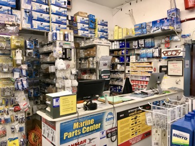 The marine parts counter and stocked parts wall at Bridge Yachts