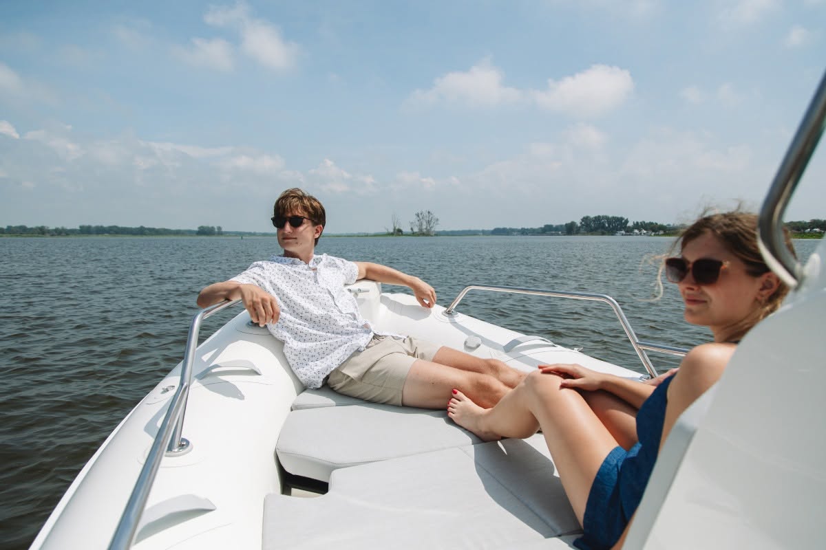 Boaters relaxing aboard a boat on the water