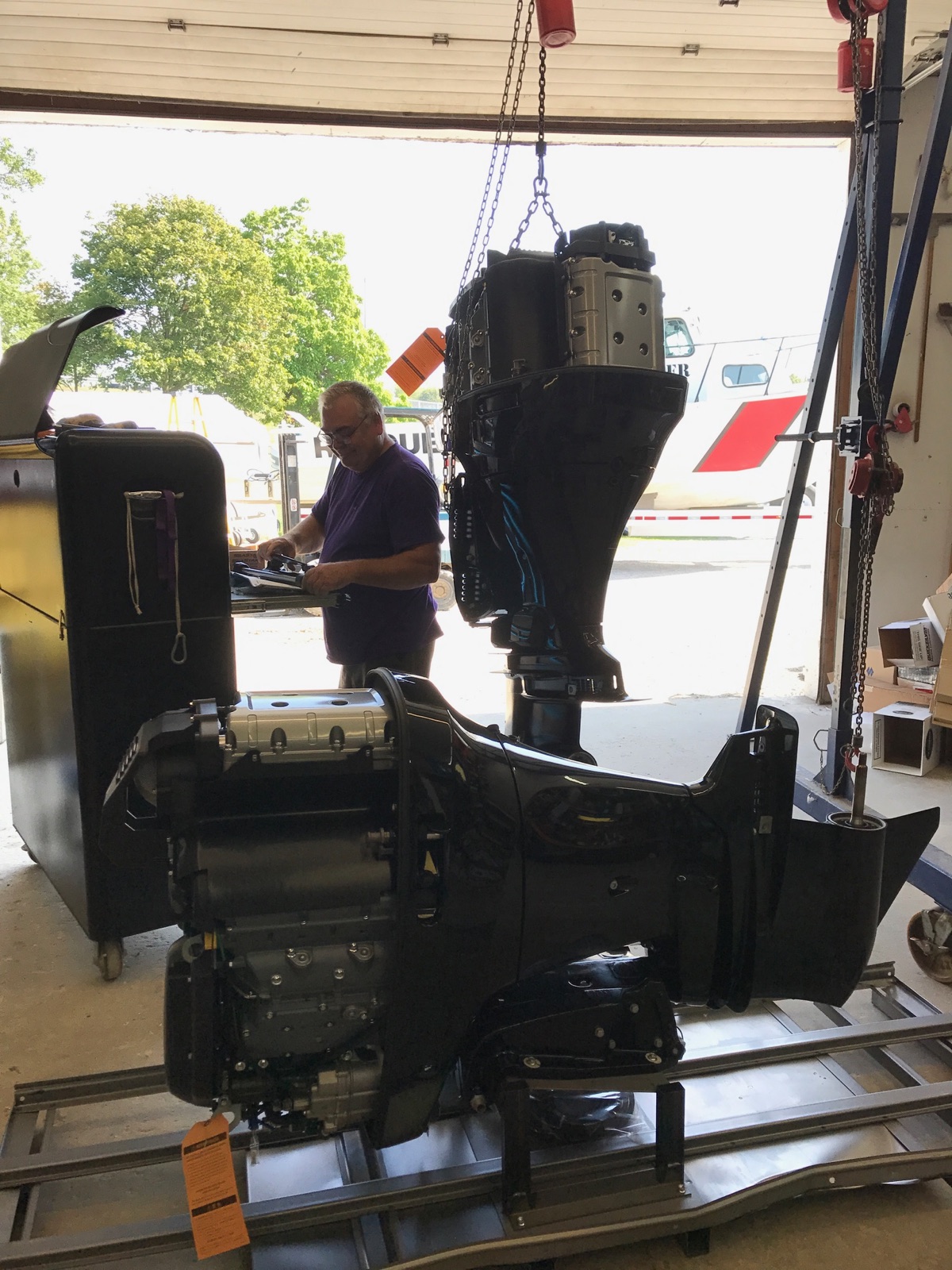 Outboard motor service work at Bridge Yachts